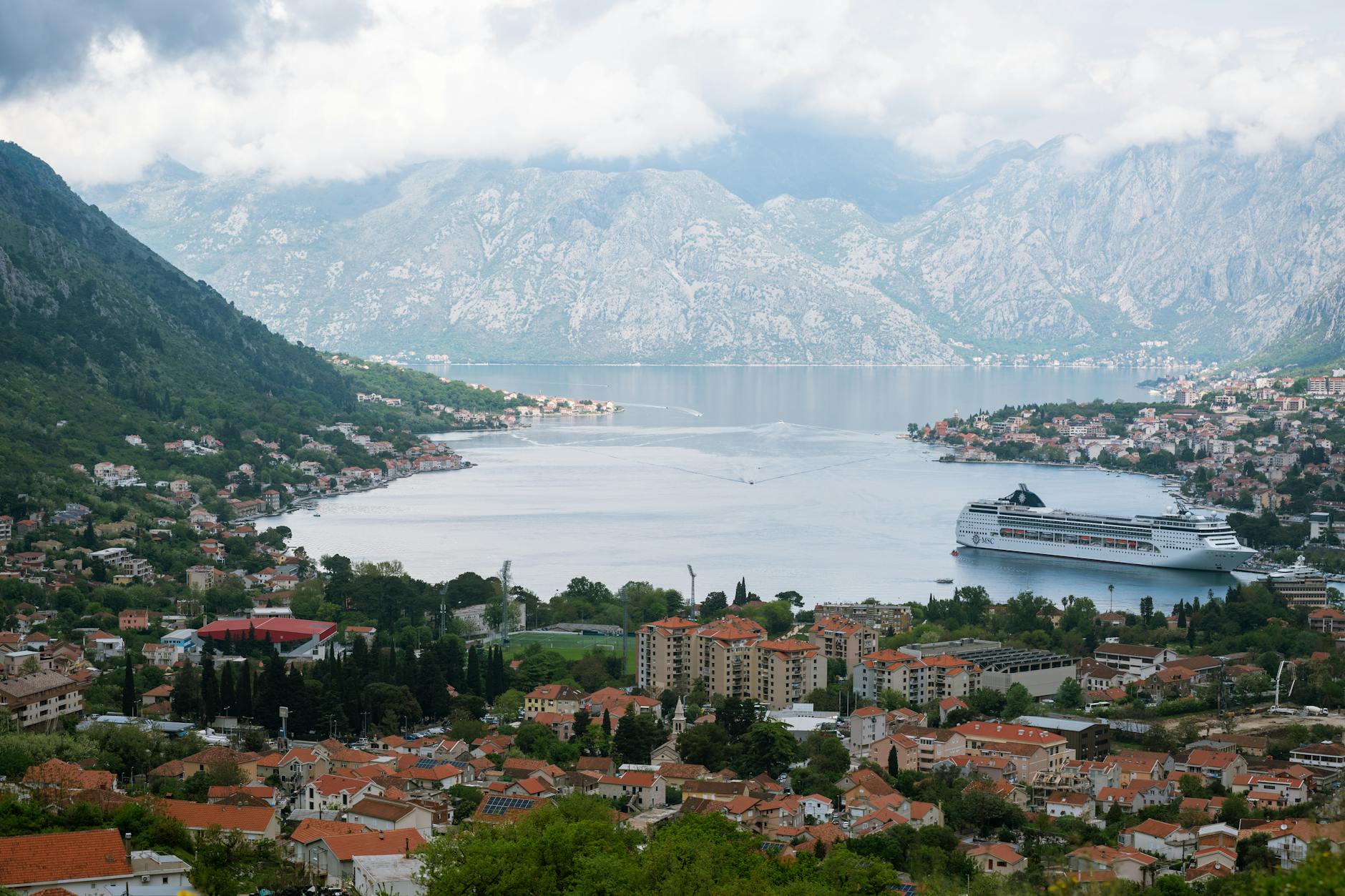 Aerial view of the Bay of Kotor and red rooftops of Kotor old town